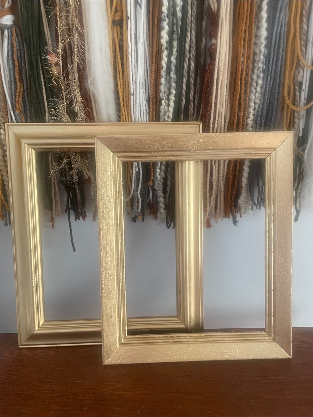 Set of 2 open wood frames gold color